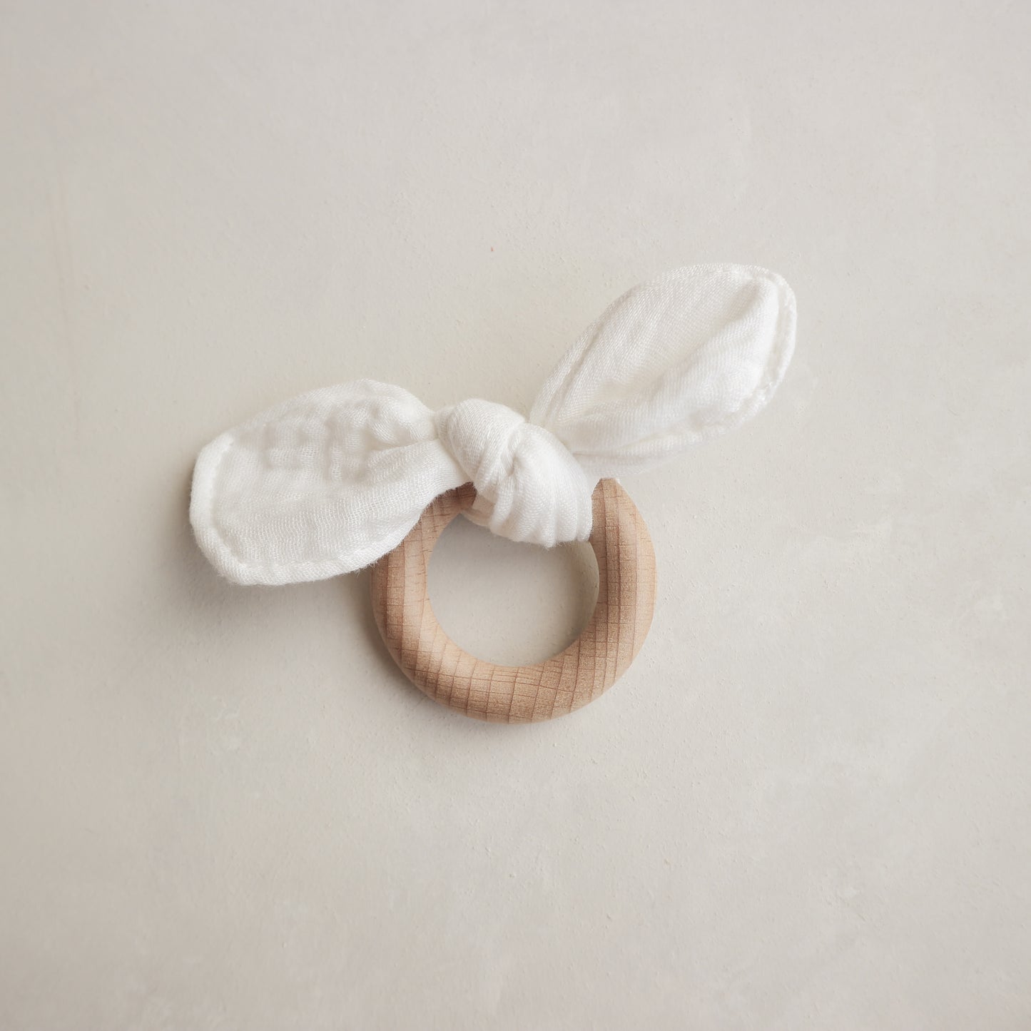 Beech wood and crinkle bow ring teether
