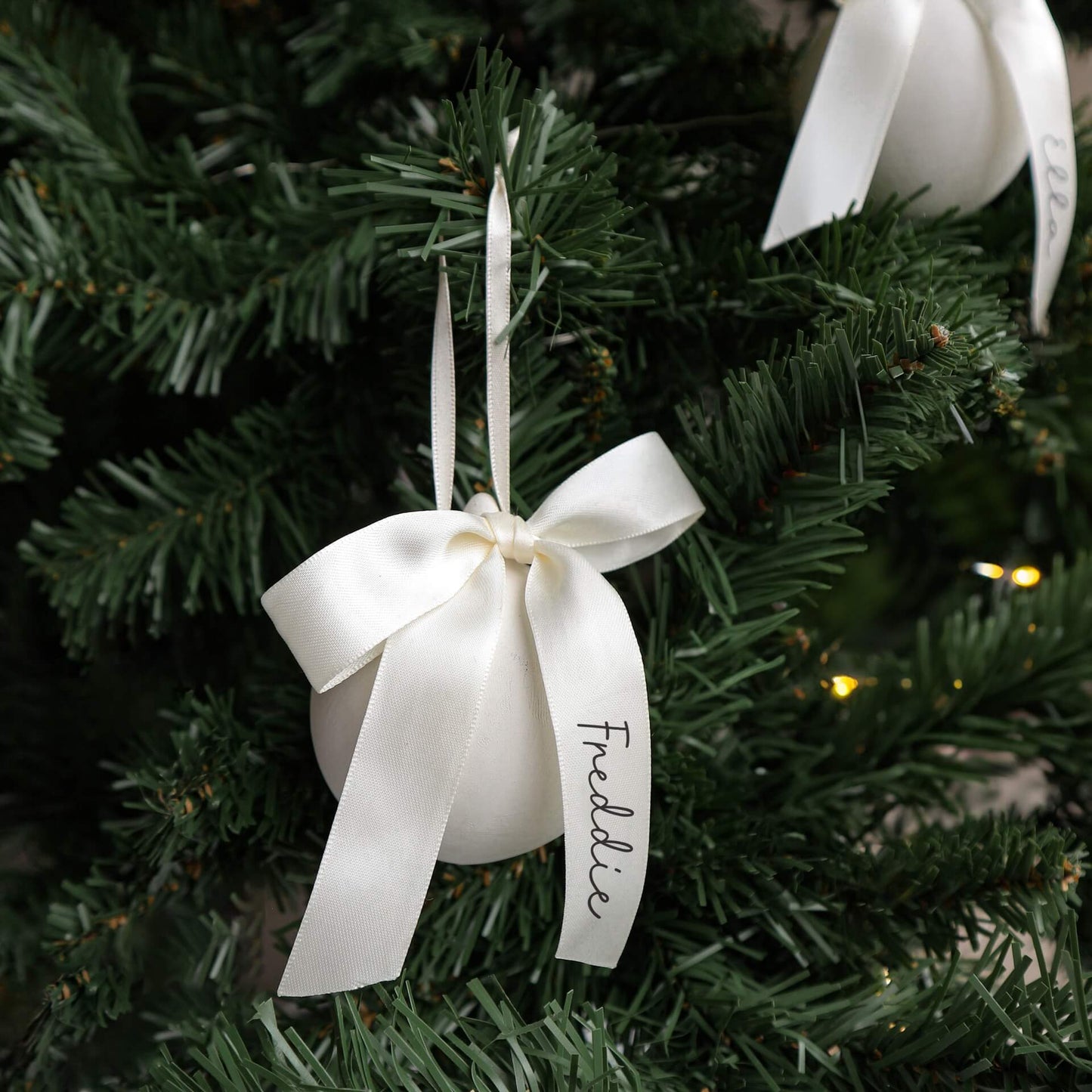 Personalised bow ceramic Christmas bauble