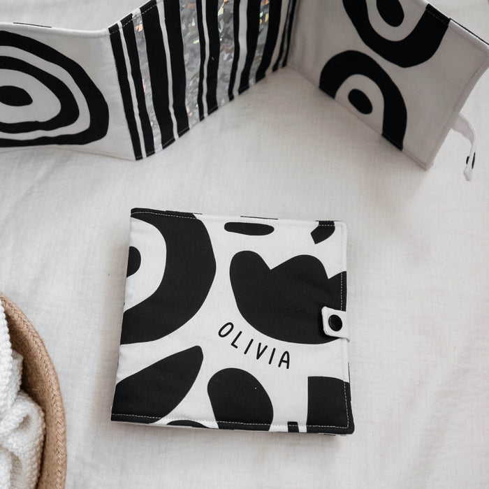 Personalised fold-out tummy time sensory book