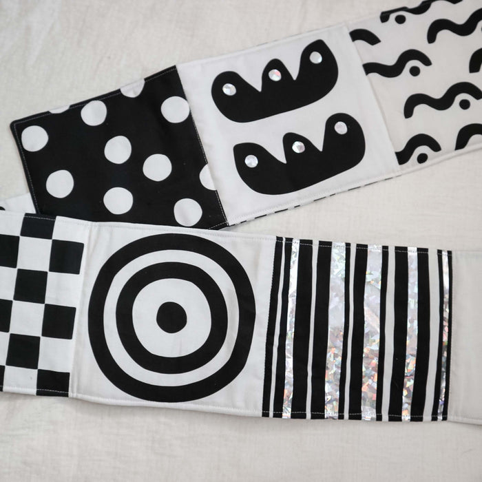 Personalised fold-out tummy time sensory book