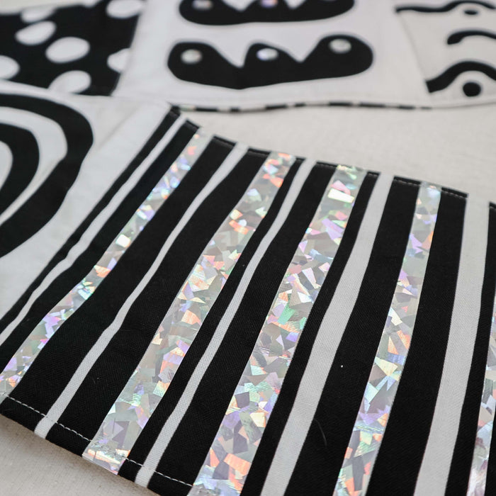 Personalised fold-out tummy time sensory book