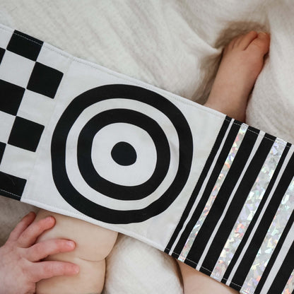 Personalised fold-out tummy time sensory book